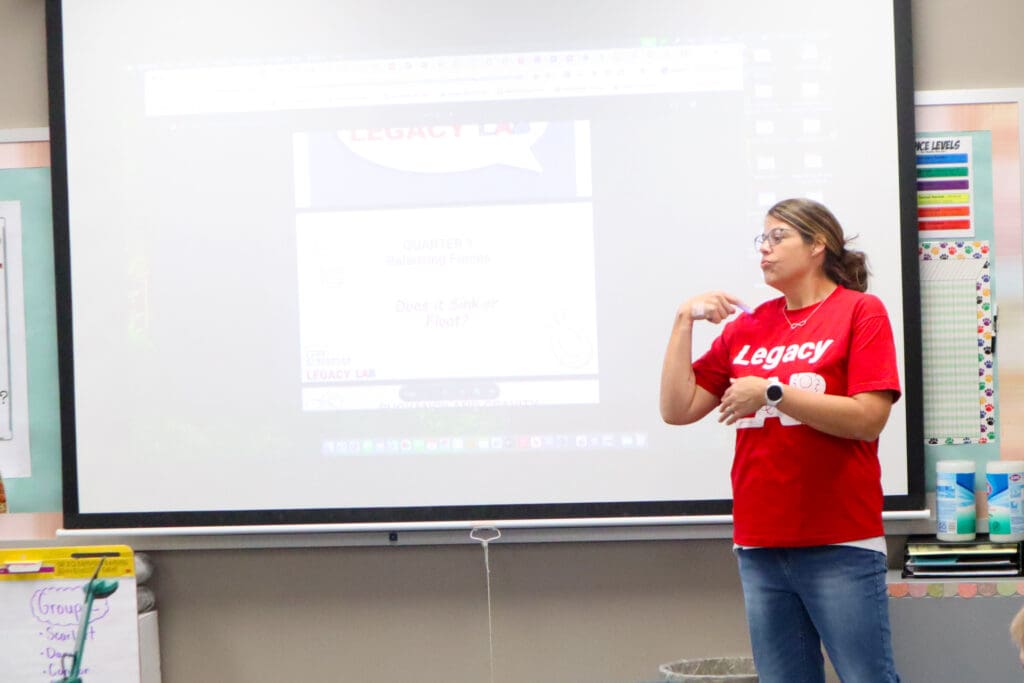 Legacy LAB founding member Kayla Pennell speaking to a classroom